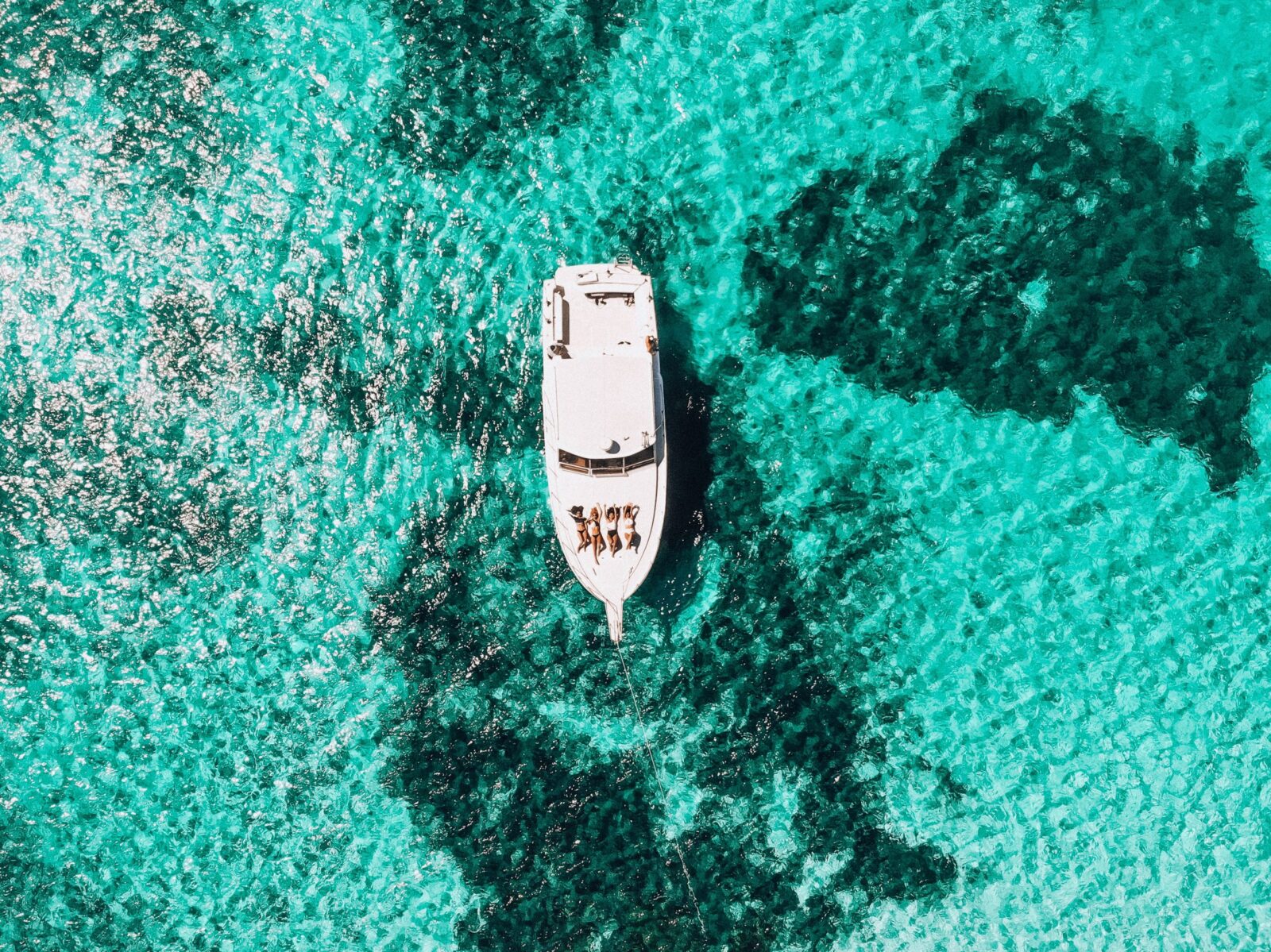 yacht in blue green water