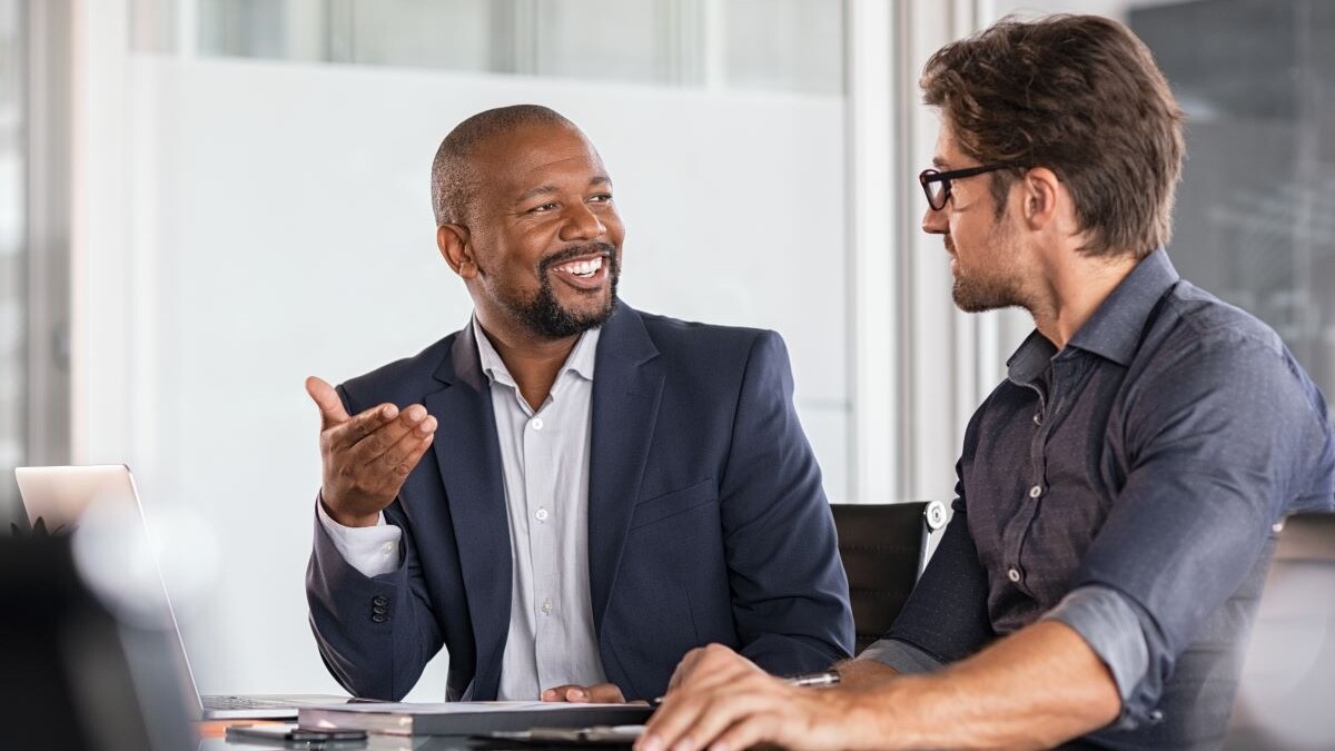 two businesspeople talking