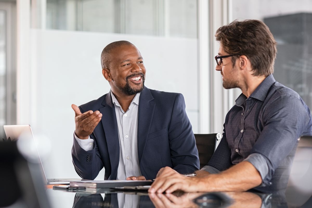 two businesspeople talking