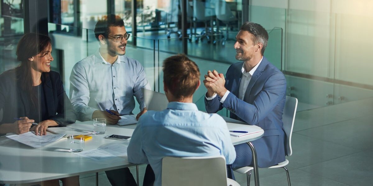 business people talking at a table