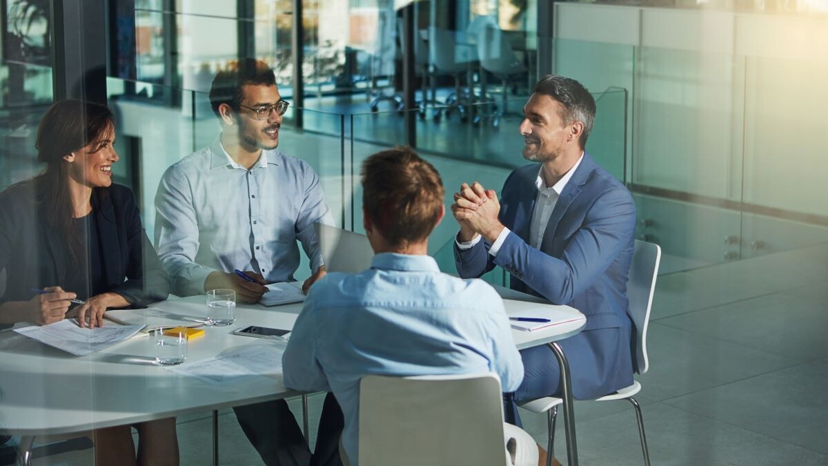 business people talking at a table