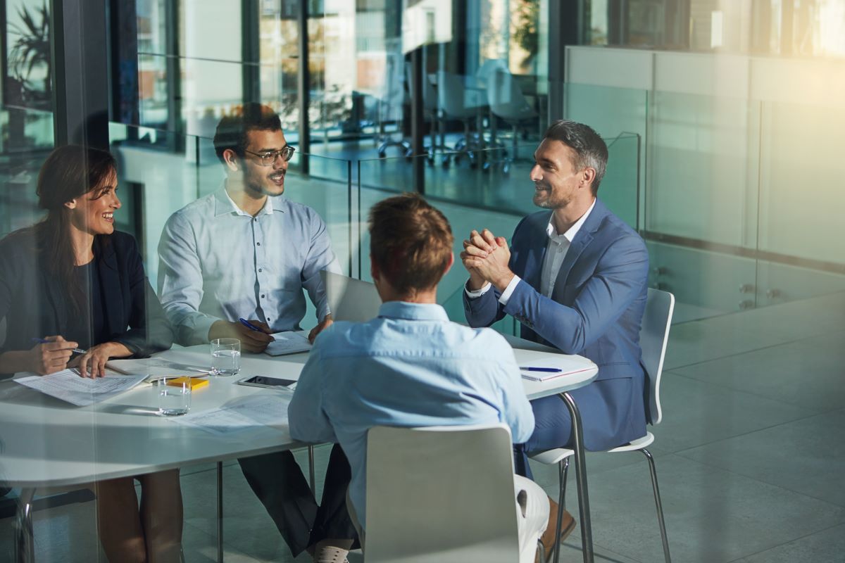 business people talking at a table