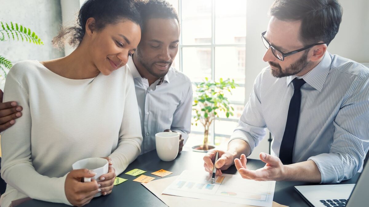 Family talking with a business person