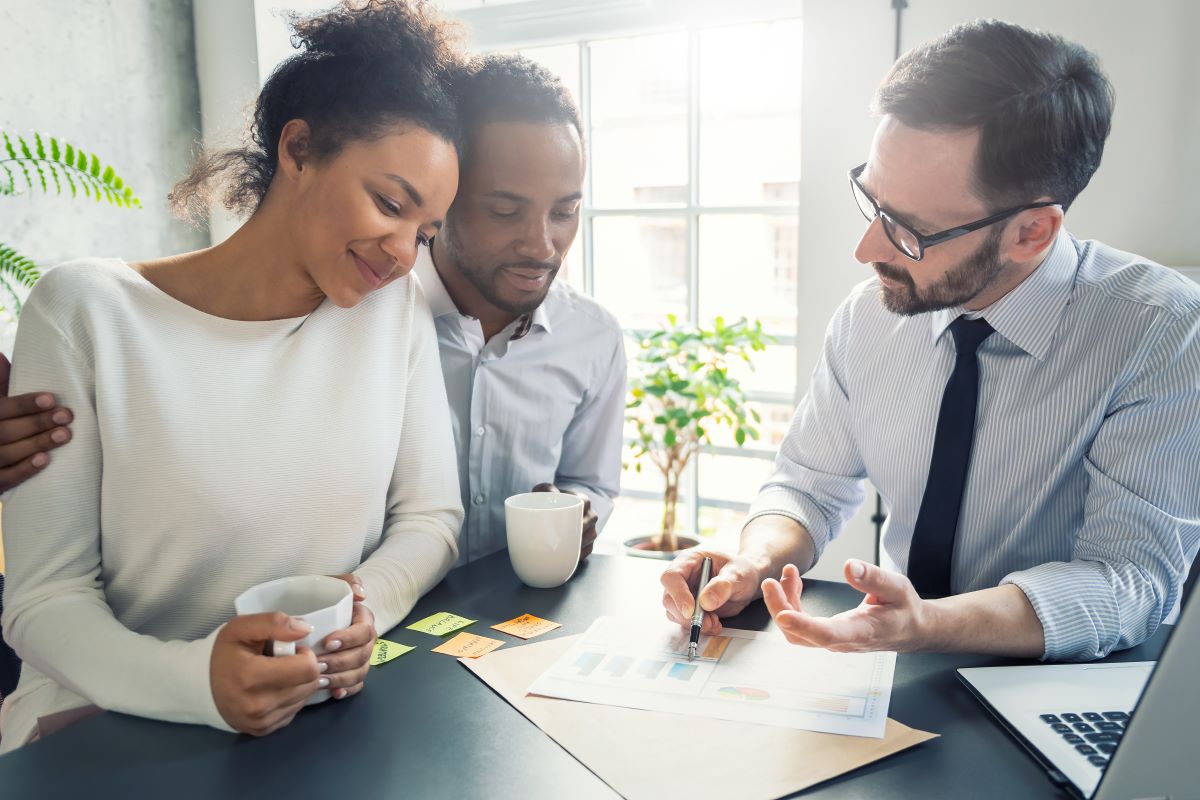 Family talking with a business person