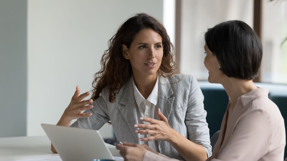 two female consultants speaking