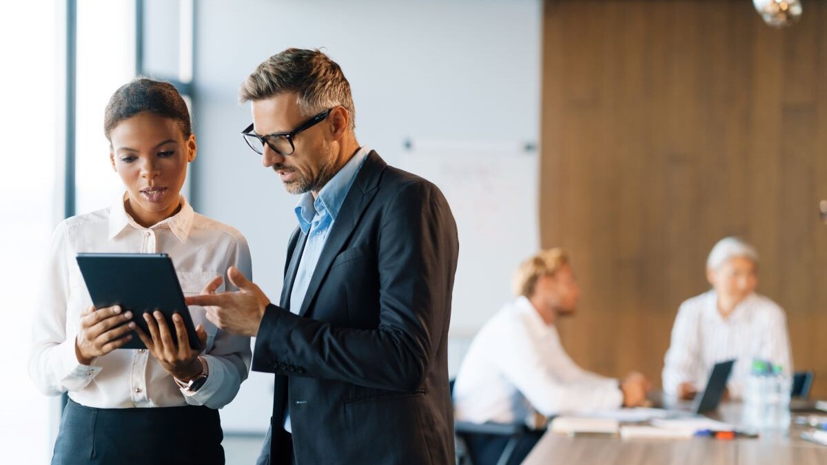 two business people speaking to each other