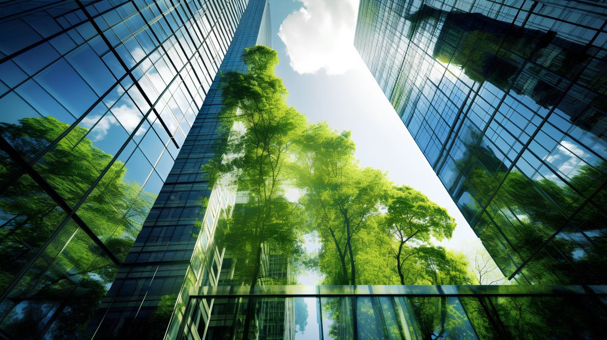 Environmental, Social, Governance concept, a corporate glass building facade reflects green trees.